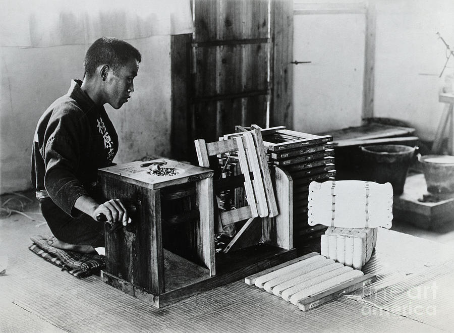 Man Reeling Silk Braid On Machine Photograph by Bettmann