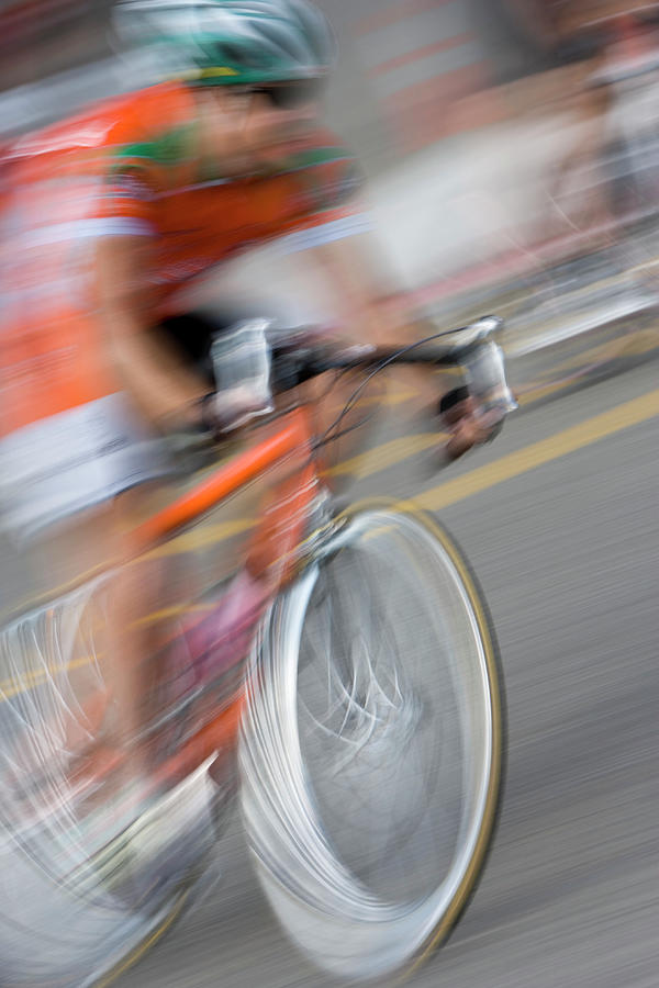 Man Riding Bicycle Defocused Photograph by Karl Weatherly