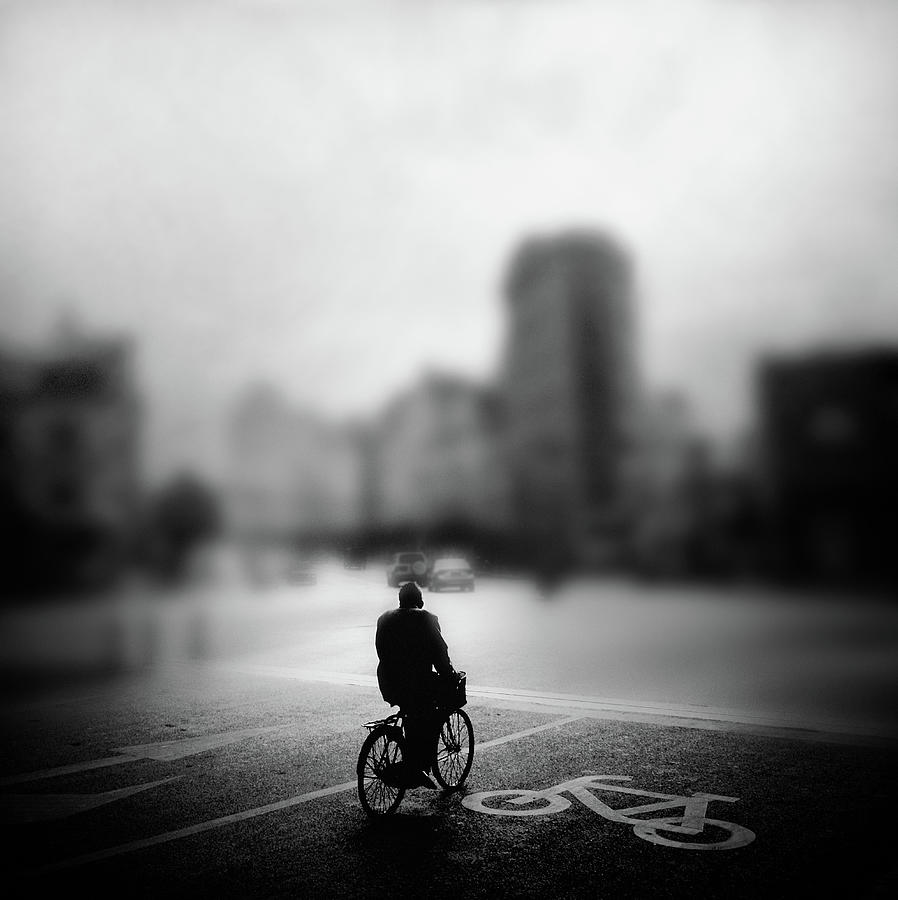 Man Riding Bycicle Photograph by Yongjun Qin