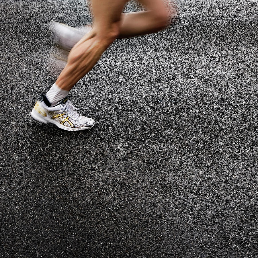 Man Running At Race Photograph by Jorge Lizana Photo