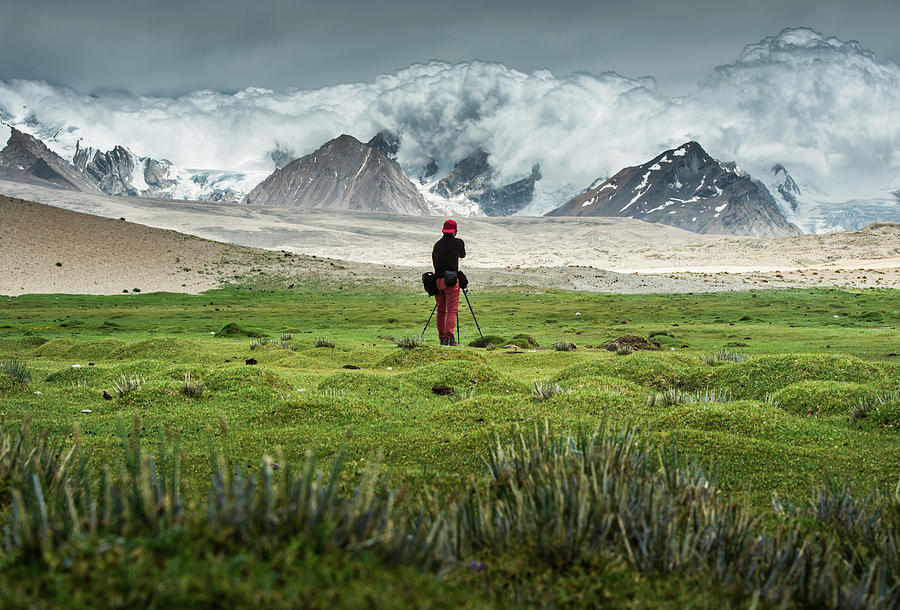 Man Shooting At Himalayas Photograph by Coolbiere Photograph