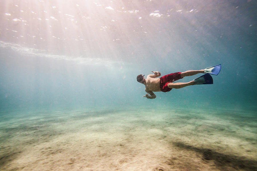 Man Showing Shaka Sign While Swimming Underwater Photograph by Cavan ...