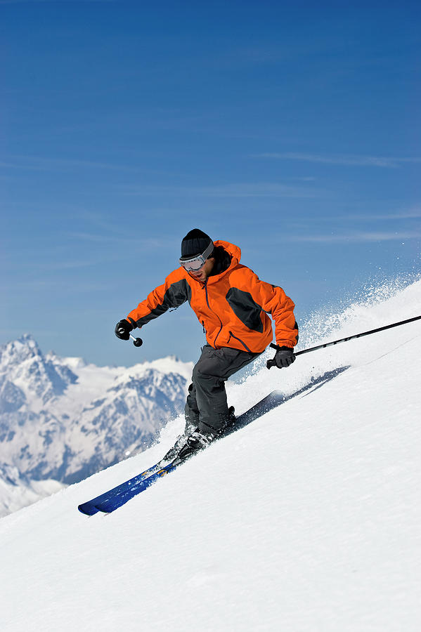 Man Snow Skiing Photograph by Jupiterimages