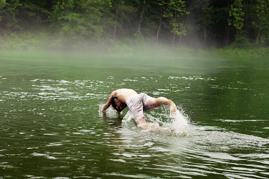 Men Fishing Near A Lake In Underwear #1 Photograph by Cavan Images