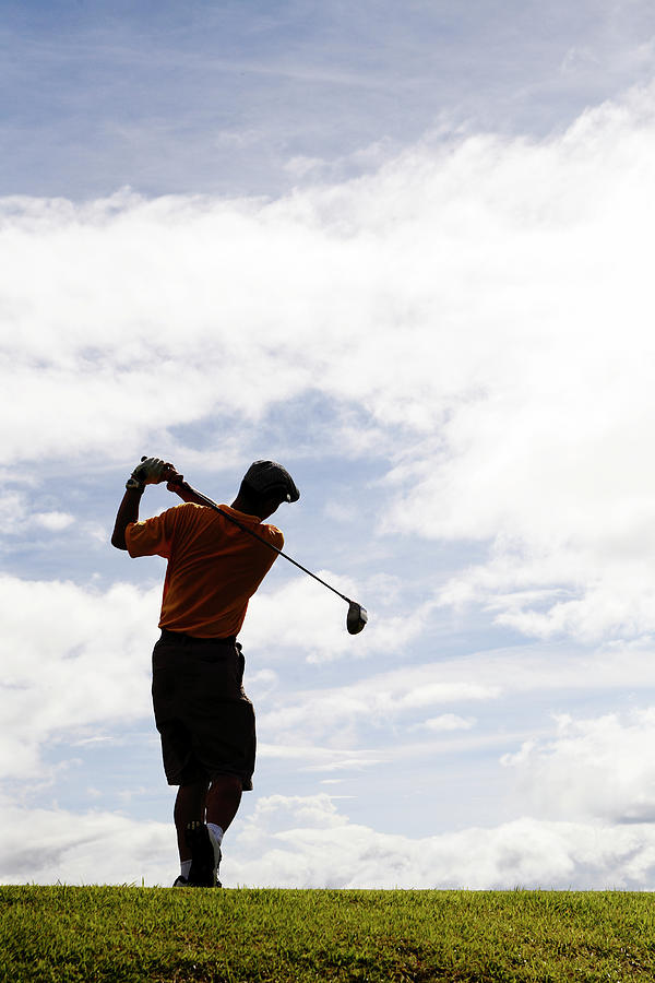 Man Swinging Golf Club Rear View Photograph By Kazuhiro Tanda