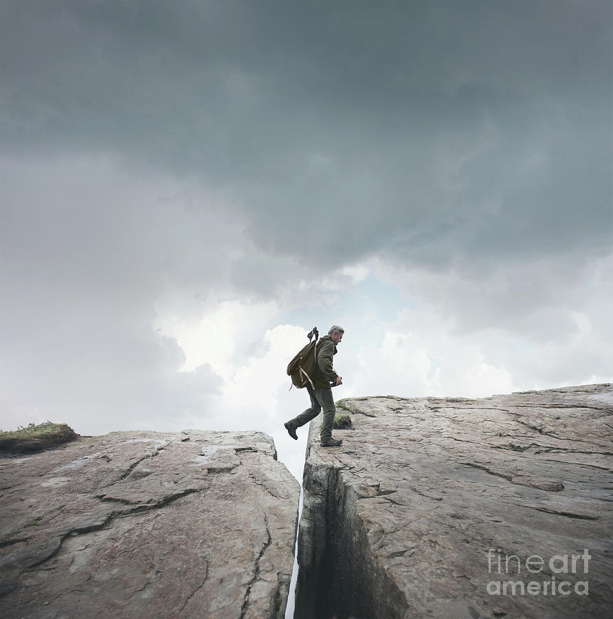 Man Trekking, Crossing Chasm Photograph by Stanislaw Pytel