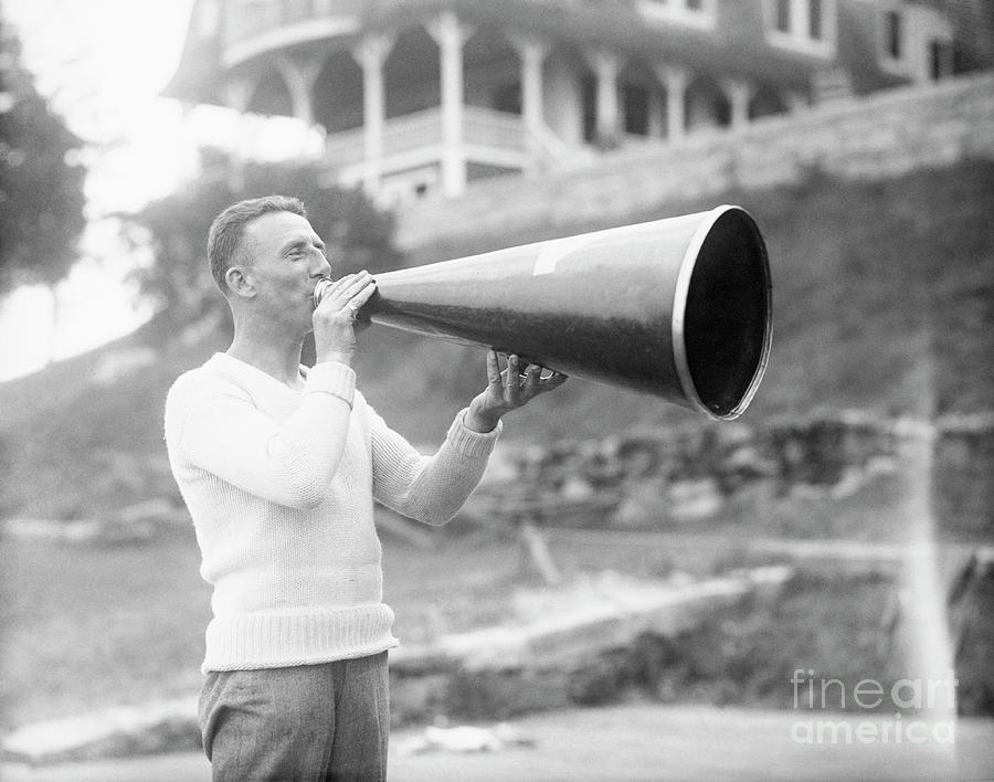 Man Using A Megaphone Photograph by Bettmann