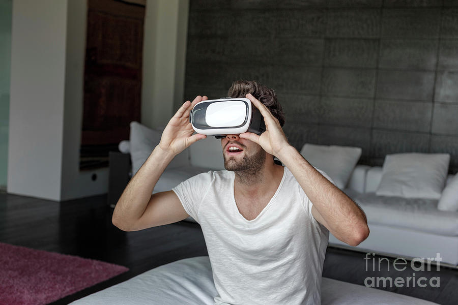 Man Using Virtual Reality Headset Photograph by Sakkmesterke/science Photo Library