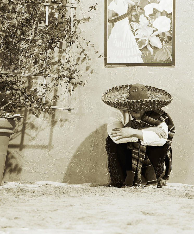Man Wearing Hat, Crouching By Wall Photograph by Lisa Peardon Man Wearing Hat, Crouching By Wall Photograph by Lisa Peardon