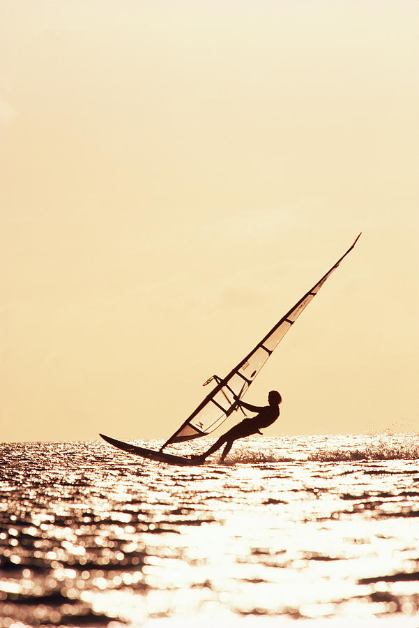 Sports Photograph - Man Windsurfing by Karl Weatherly