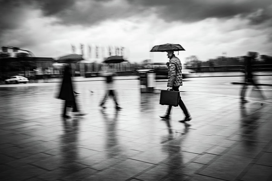 Man with briefcase and umbrella Photograph by Ute Herzog