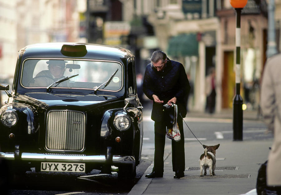 Man with dog London taxi Photograph by David L Moore