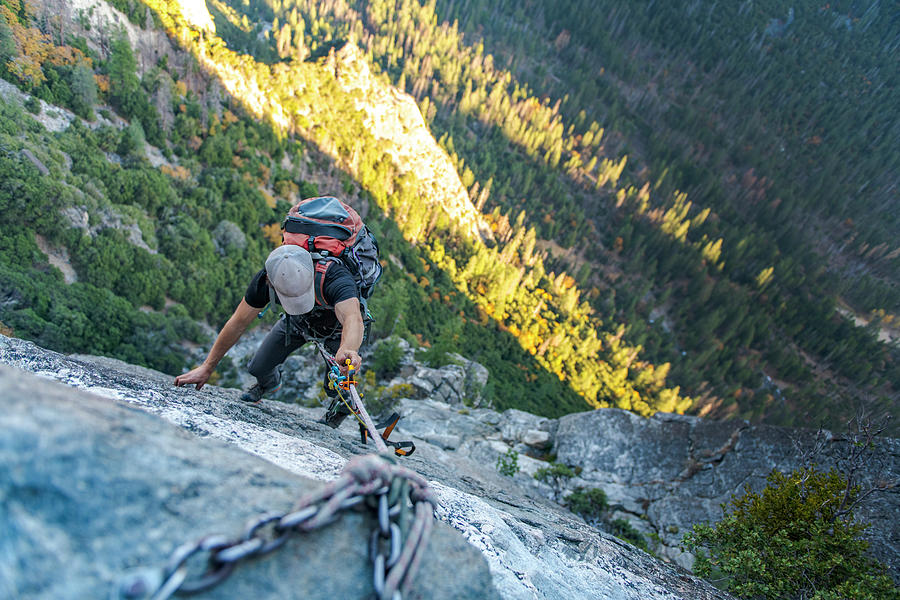 Man With Hat Looking Down Jugging Rope Up With Backpack On El Capitan ...