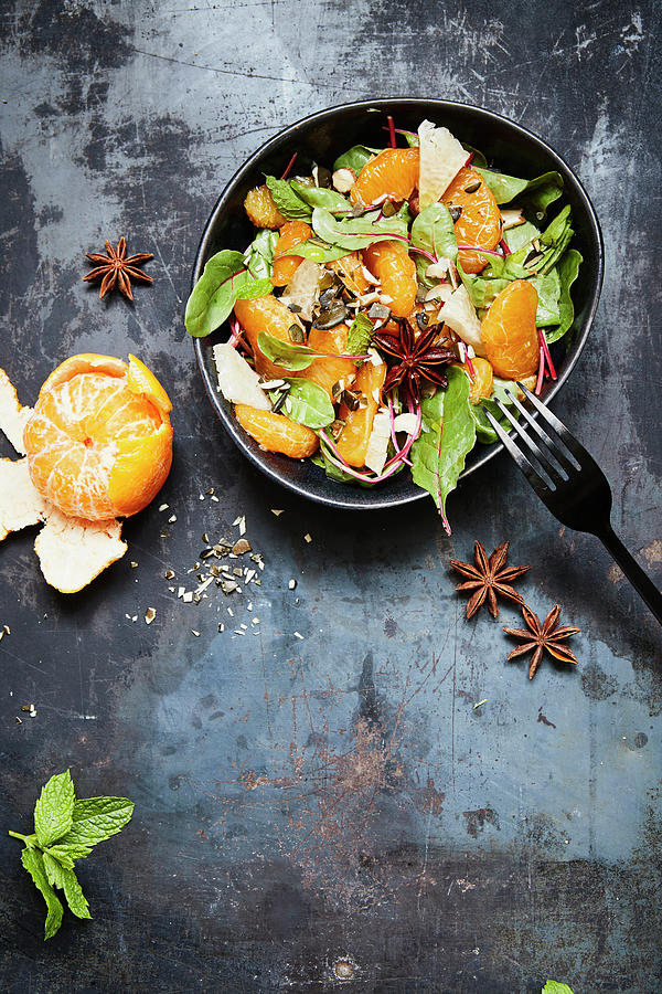 Mandarin And Pomelo Salad With Young Swiss Chard And Star Anise Photograph by Brigitte Sporrer / Stockfood Studios