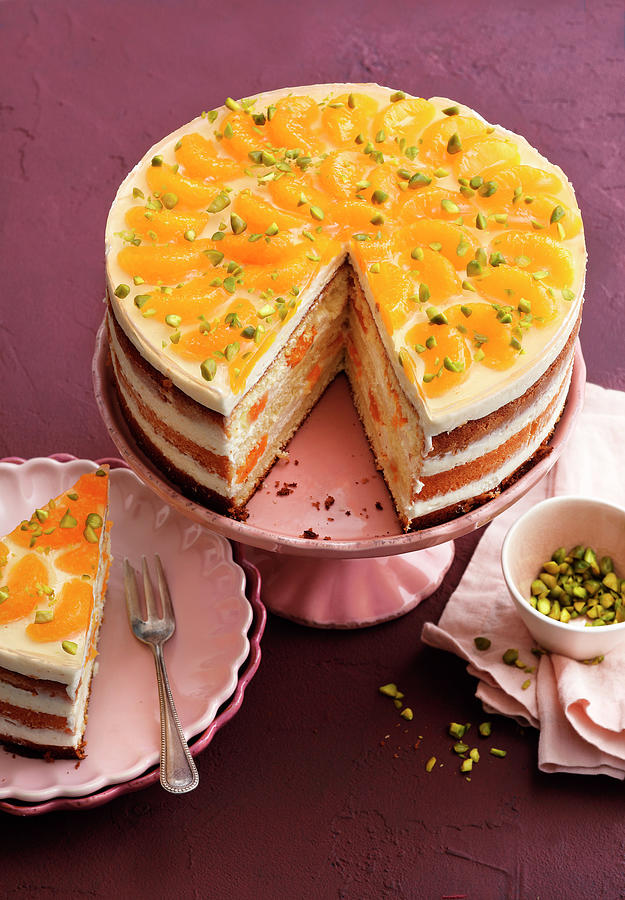 Mandarin Cheesecake With Pistachios Photograph by Mathias Stockfood Studios / Neubauer