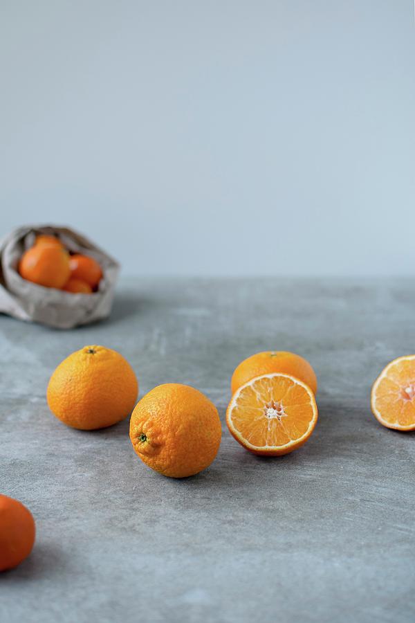 Mandarins, Whole And Halved Photograph by Justina Ramanauskiene