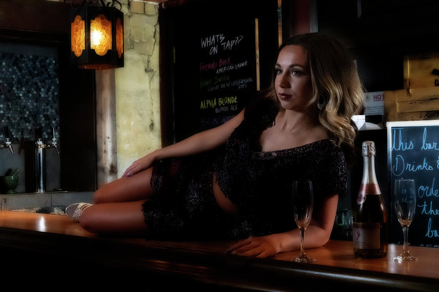 Mandy posing on the bar Photograph by Dan Friend