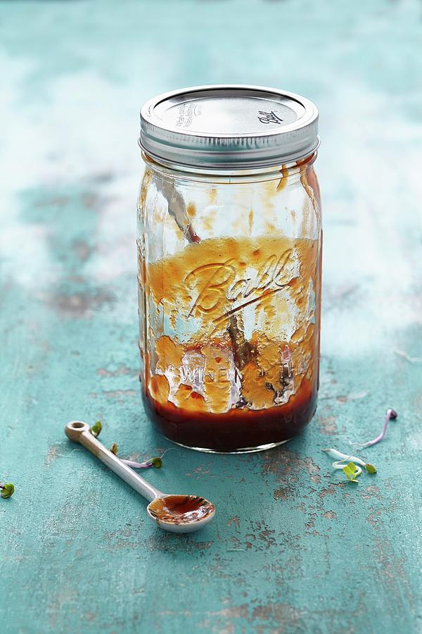 Mango And Barbecue Sauce In A Glass Jar Photograph by Sabrina Sue Daniels