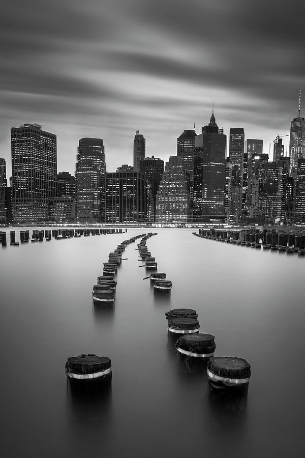 Black And White Photograph - Manhatan Piles Vertical by Moises Levy