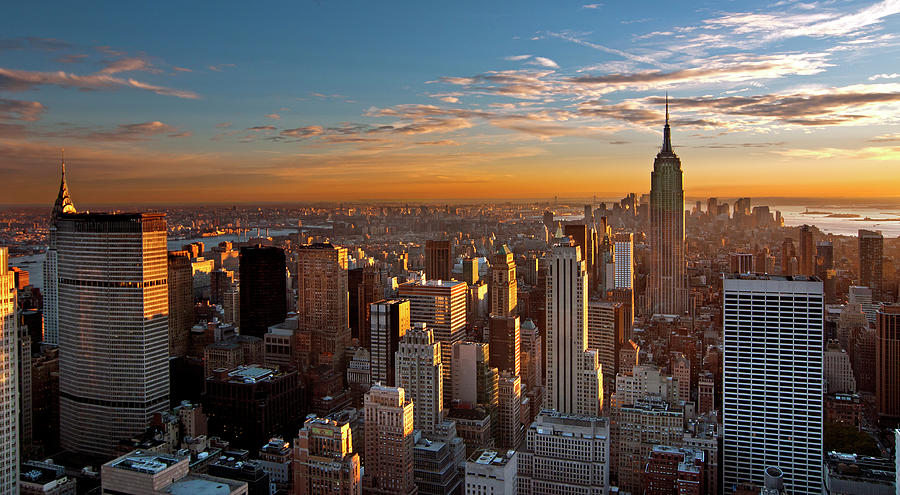 Manhattan Skyline At Sunset by Inigo Cia