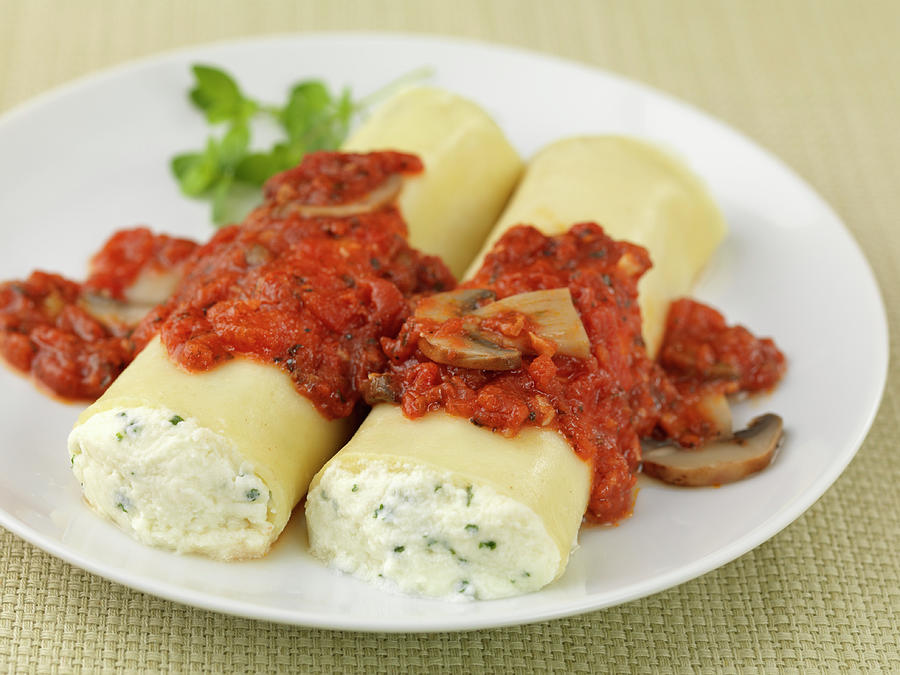 Manicotti Filled With Ricotta With A Tomato And Mushroom Sauce Photograph by Jim Scherer