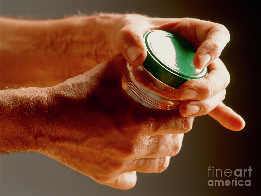 Mans Hands Clasping A Jar Photograph by Oscar Burriel/science Photo Library