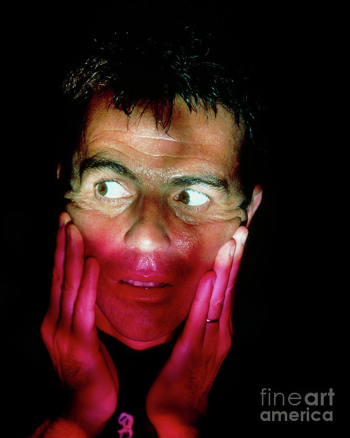 Mans Sweating Face In Expression Of Fear In Dark Photograph by Oscar Burriel/science Photo Library