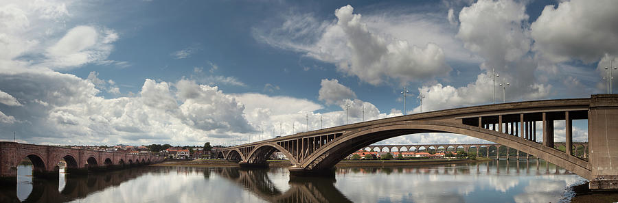 Many Bridges With Clouds Reflected In Photograph by John Short / Design Pics