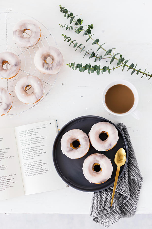 Marble Donuts With White Icing, Served With Coffee Photograph by Maria Panzer