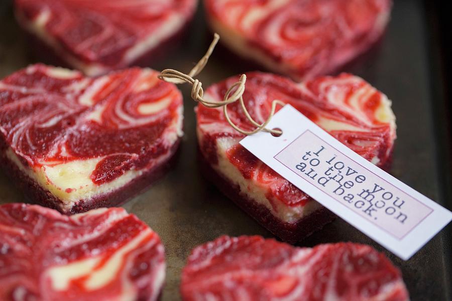 Marbled Heart-shaped Mini Cheesecakes With A Gift Tag For Valentines Day Photograph by Eising Studio