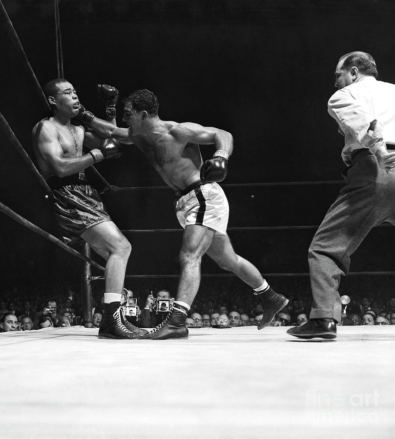 Marciano And Louis Fight Photograph by Bettmann