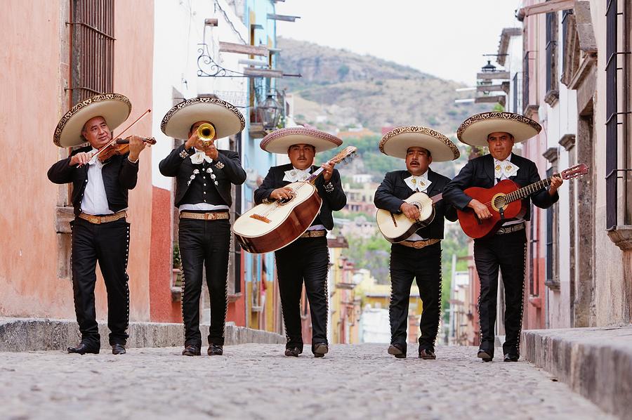 Mariachi Band Walking In Street Photograph by Pixelchrome Inc