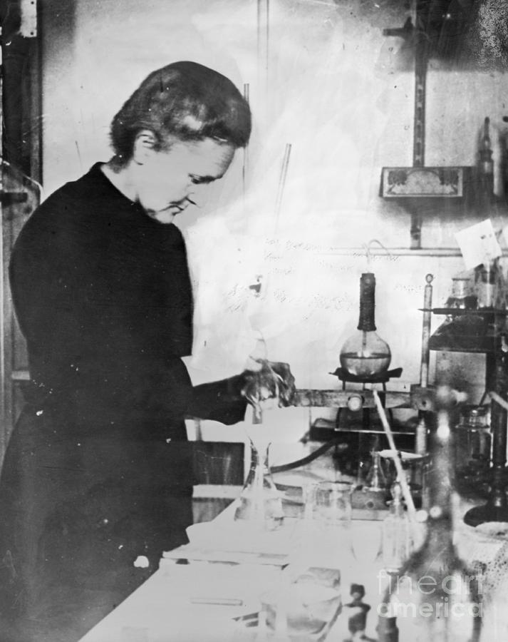 Marie Curie At Work In Her Laboratory Photograph by Bettmann