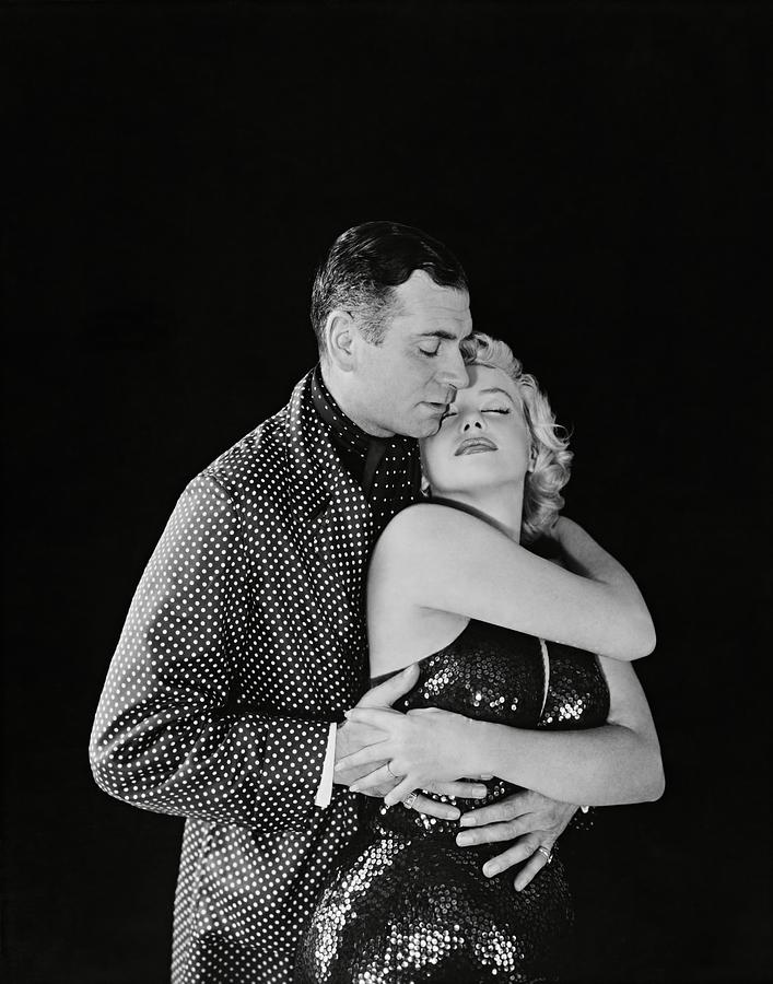 MARILYN MONROE and LAURENCE OLIVIER in THE PRINCE AND THE SHOWGIRL -1957-. Photograph by Album