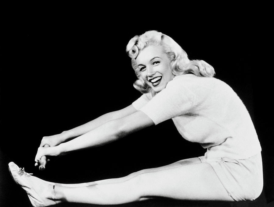 Marilyn Monroe Exercising And Smiling Photograph By Globe Photos 