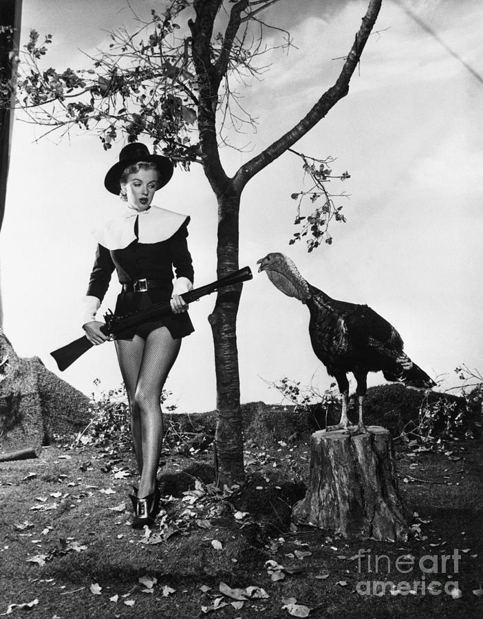 Marilyn Monroe Posing With A Turkey Photograph by Bettmann