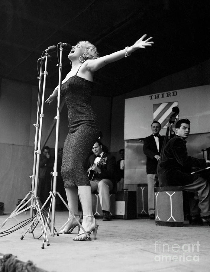 Marilyn Monroe Singing Photograph by Bettmann