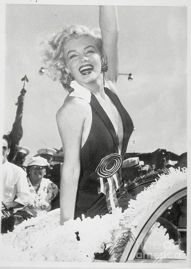 Marilyn Monroe Waving As Grand Marshal Photograph by Bettmann