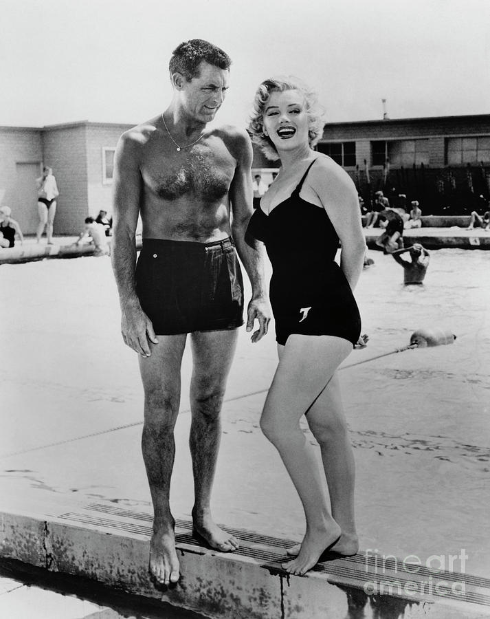 Marilyn Monroe With Cary Grant Photograph by Bettmann