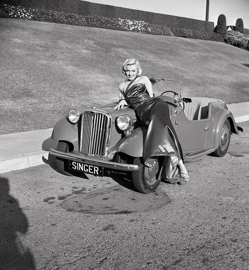 Marilyn Monroe Photograph - Marilyn Monroe With Classic Roadster by Frank Worth