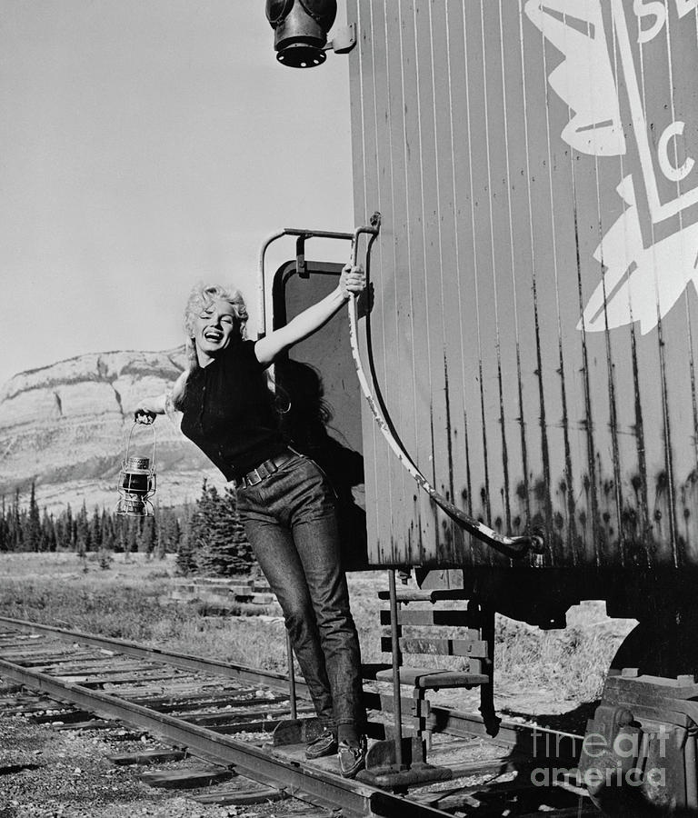 Marilyn Monroe With One Arm On Caboose Photograph by Bettmann