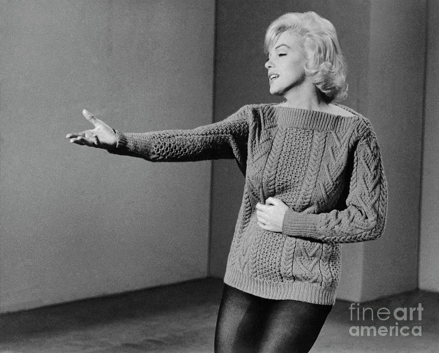 Marilyn Monroe With One Arm Outstretched Photograph by Bettmann