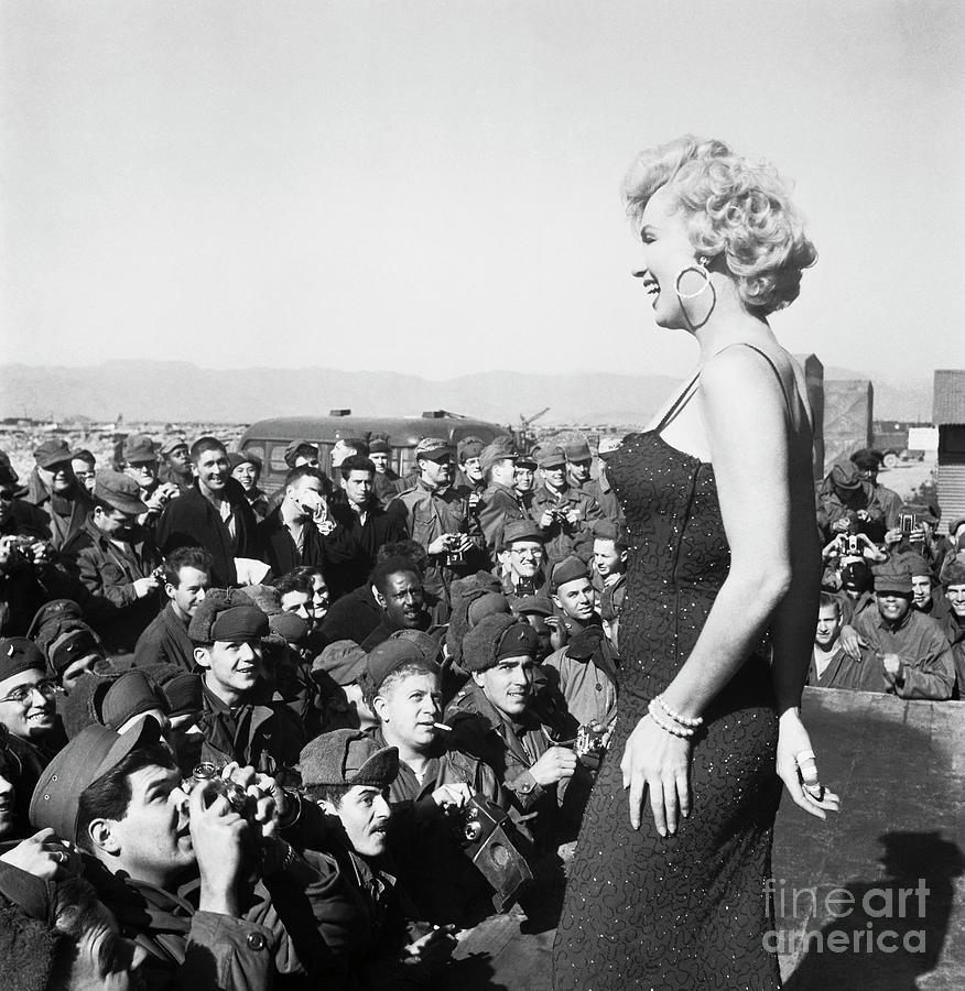 Marilyn Monroe With Troops Photograph by Bettmann