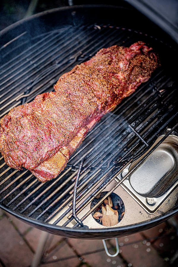 Marinated Beef Ribs On A Grill Photograph by Sebastian Schollmeyer