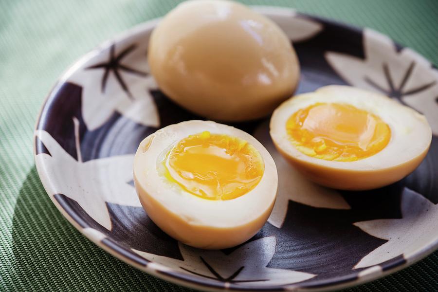 Marinated Boiled Eggs As A Topping For Japanese Ramen Soup Photograph by Colin Cooke