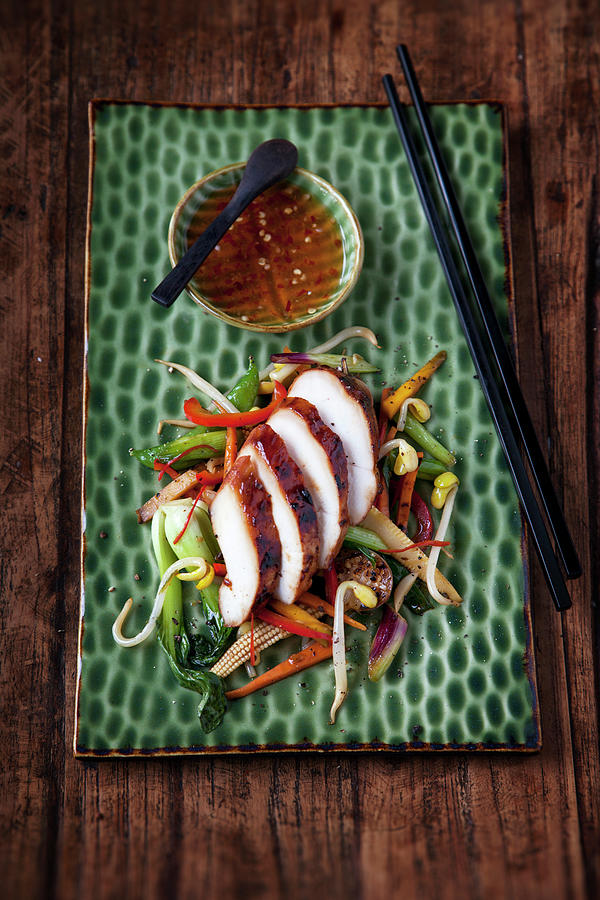 Marinated Chicken Breast With Colourful Stir-fried Vegetables Photograph by Michael Wissing
