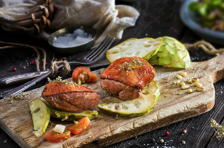Marinated Duck Breast On Cherimoya Slices Photograph by Christian Schuster