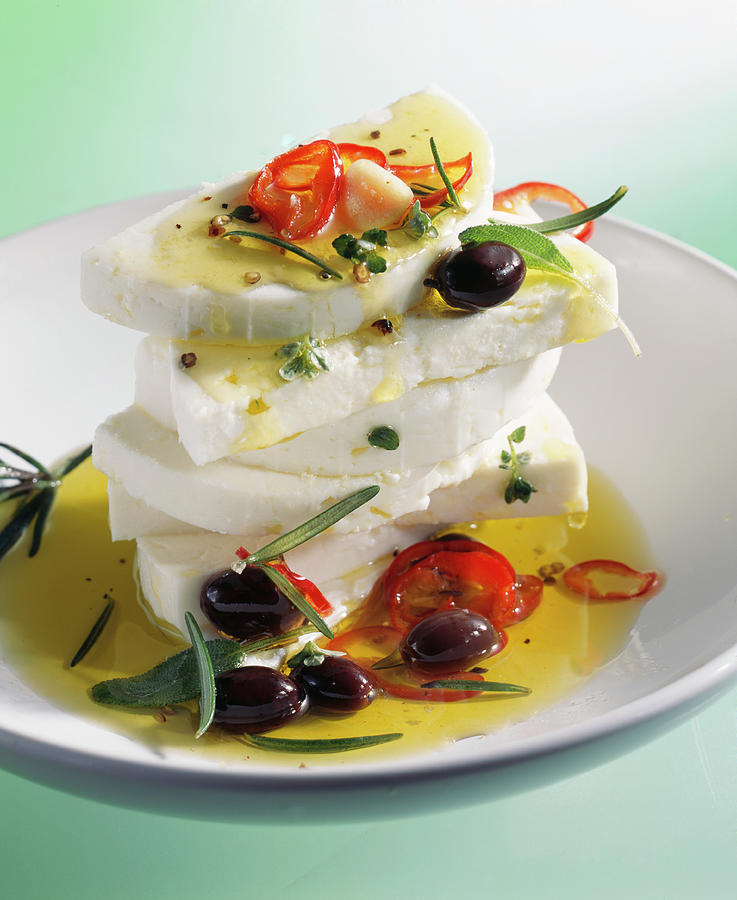 Marinated Feta Cheese With Olive Oil, Chilli Peppers, Olives And Rosemary Photograph by Teubner Foodfoto
