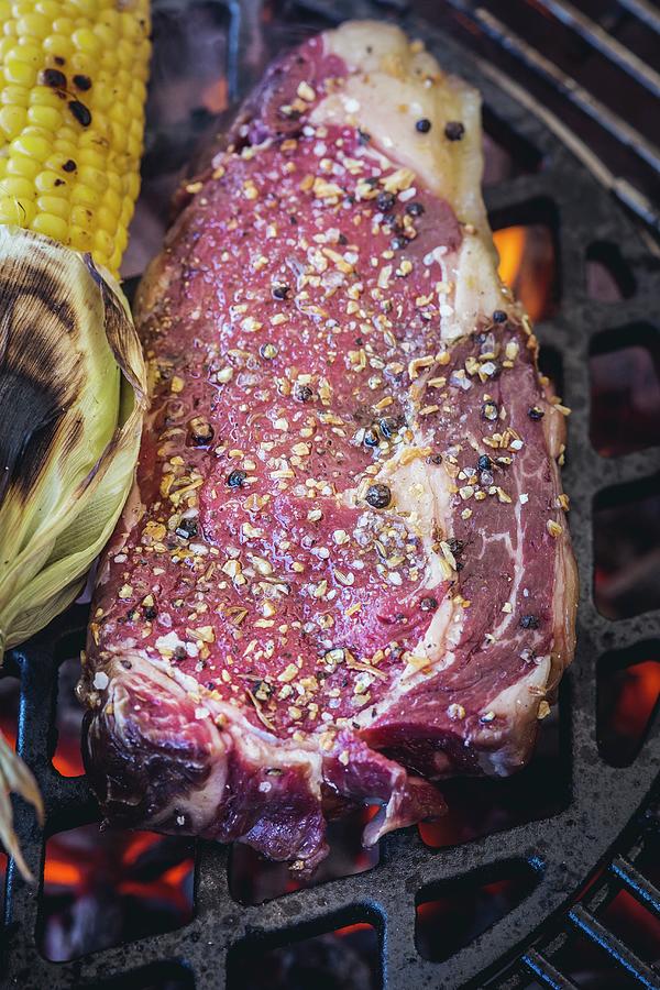 Marinated Rib-eye Steak On The Barbecue Photograph by Eising Studio