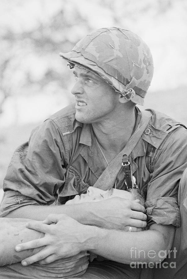 Marine Comforting Comrade Photograph by Bettmann